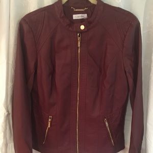 Woman’s medium leather look jacket